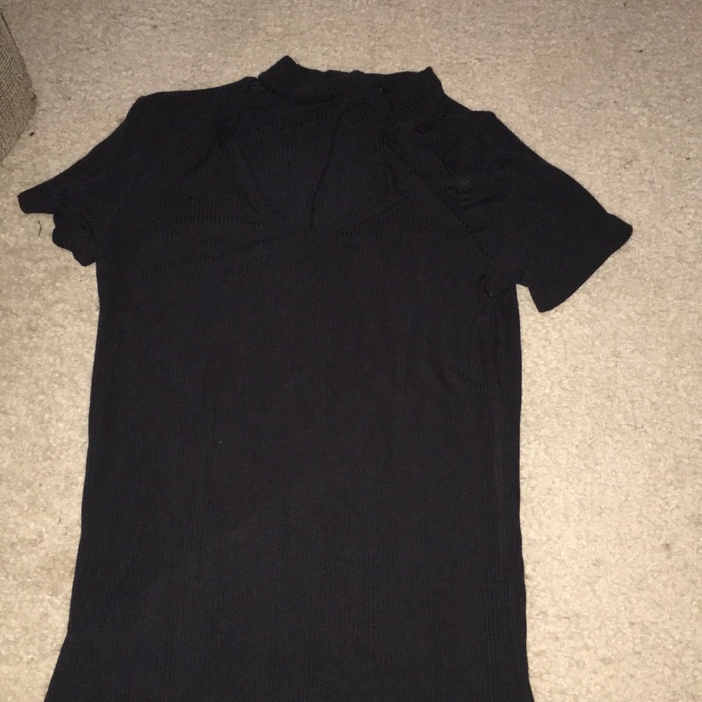 Black top with large chest cutout with a midi line